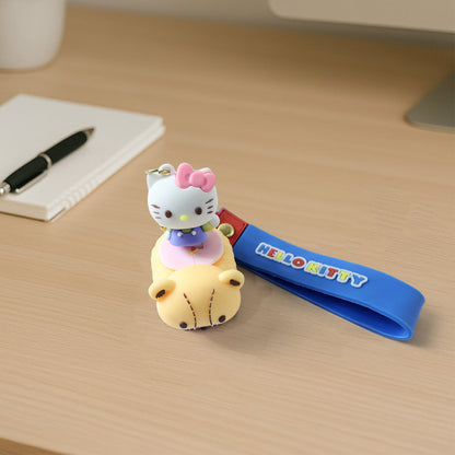 Cute Cartoon Cat Riding Toy Car Silicone Keychain (1 Pc)